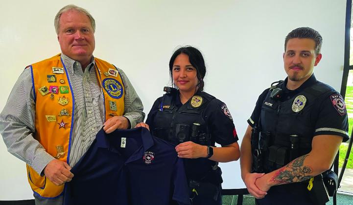 Dan Shook photo The Bay City Lion’s Club donated polo shirts to the Bay City Police Department patrol division. These shirts are for officers to dress uniformly when attending training sessions without wearing their patrol uniforms.   