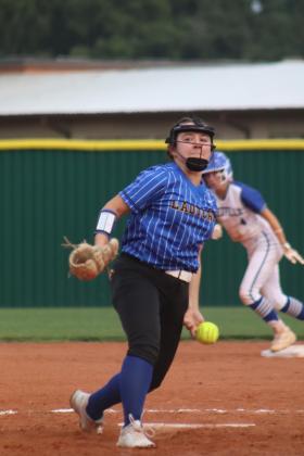 The Ladycats’ pitcher prepares to deliver in the Game 1 at the Bay City Girls’ 1st Round Playoff Series Vs Needville In Wharton April 26. The Ladycats lost 10-0. LeDarion Stone /Live in the Moment Photography